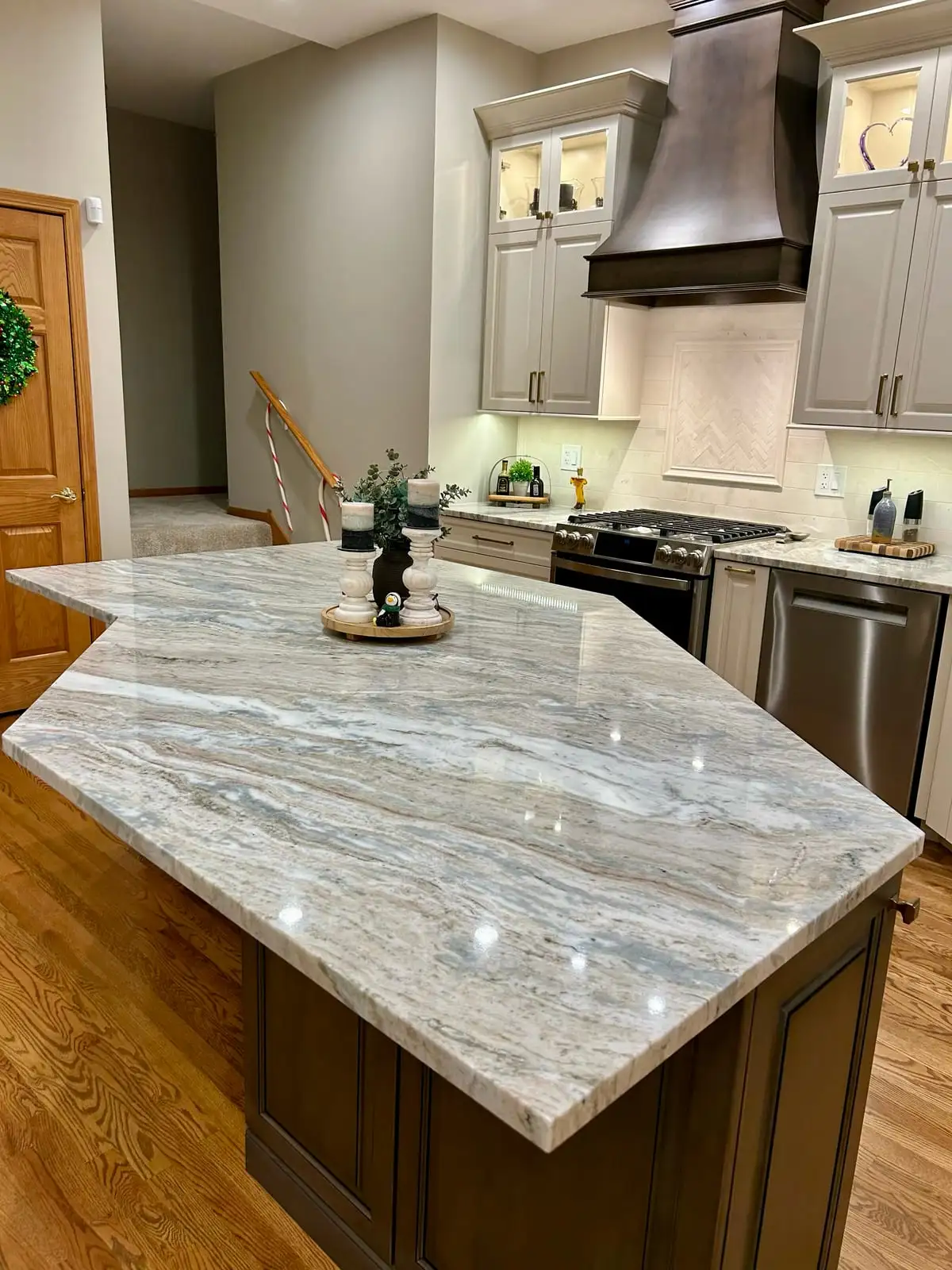 Close view of flowing fantasy brown granite on a large kitchen island